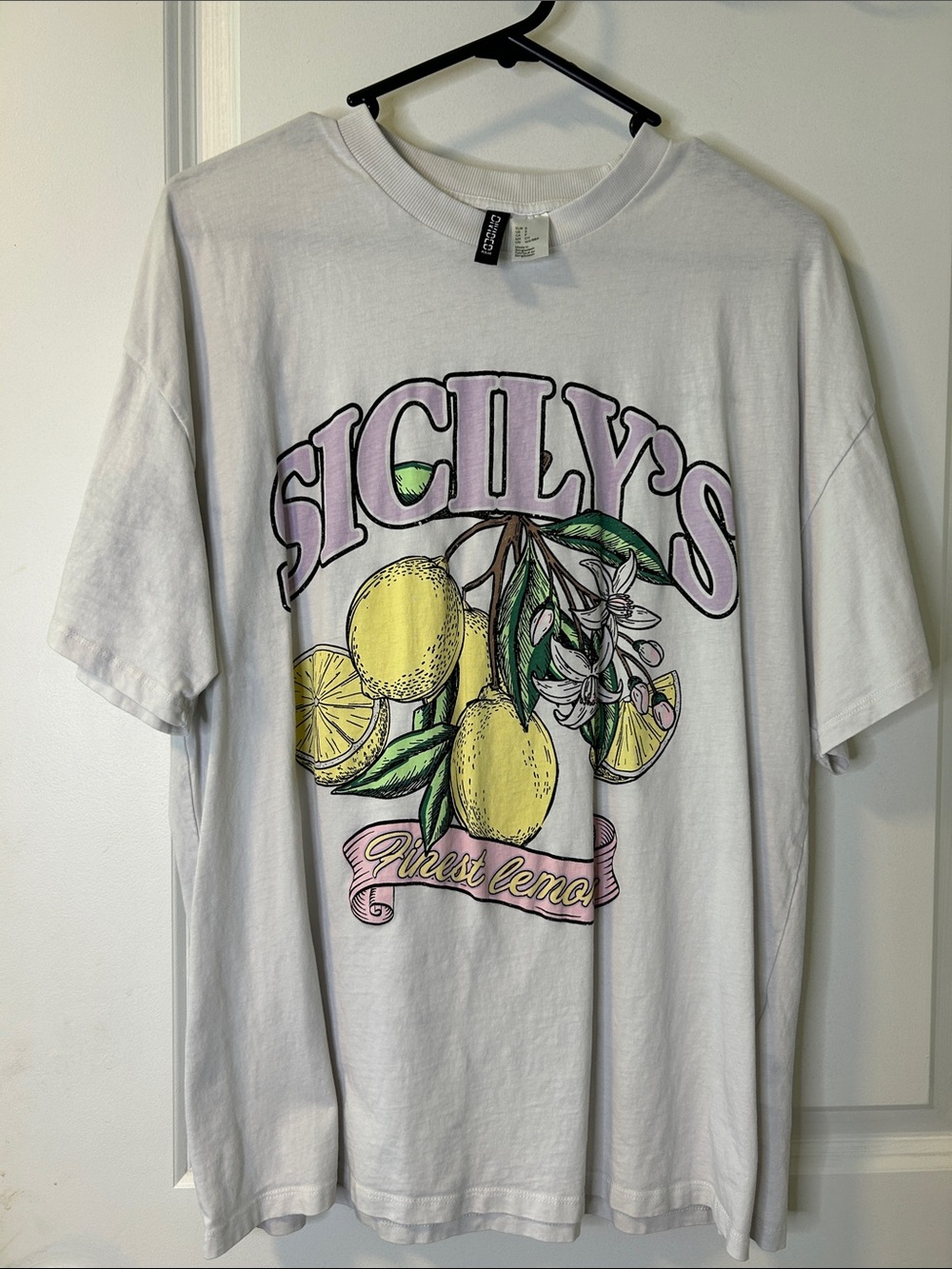 Divided White Tee with Yellow Lemon Graphic and Light Pink Lettering